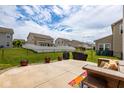 Spacious backyard featuring a concrete patio perfect for entertaining and outdoor enjoyment at 6683 School Branch Dr, Brownsburg, IN 46112