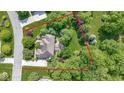 An aerial view of the home highlighting its lush green surroundings at 7372 Fox Hollow Rdg, Zionsville, IN 46077