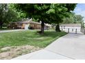 View of the front exterior and a portion of the lawn at 76 Manhattan Ave, Indianapolis, IN 46241