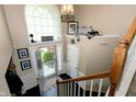 Elegant foyer featuring a large window, decor, and an open view of the front entrance at 11727 Wedgeport Ln, Fishers, IN 46037