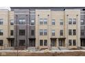 Row of newly constructed townhomes, each with a brick facade at 1216 N Alabama St, Indianapolis, IN 46202