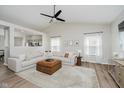 Bright living room featuring vaulted ceilings, large windows, and contemporary furnishings at 18760 Pilot Mills Dr, Noblesville, IN 46062