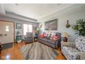 Cozy living room with a comfortable sofa, artwork, and a warm, inviting atmosphere at 188 Bay Ridge Dr, Pendleton, IN 46064