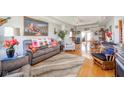 Bright living room with hardwood floors, large painting, and comfortable furnishings at 188 Bay Ridge Dr, Pendleton, IN 46064