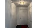 Bright entryway featuring a white front door, overhead lighting and white walls at 240 Legends Creek Pl # Apt 310, Indianapolis, IN 46229