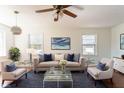 Bright living room featuring plush seating, natural light, and stylish decor at 370 N Bazil Ave, Indianapolis, IN 46219