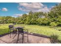 Spacious backyard with a patio, perfect for outdoor entertaining and relaxation at 450 Columbia Ct, Greenwood, IN 46142