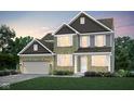 Charming two-story home featuring a brick and siding facade and an attached two-car garage at 7242 Barrett Dr, Brownsburg, IN 46112