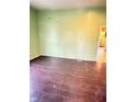 Open Living Room with Hardwood floors, ready to make new memories at 834 N Temple Ave, Indianapolis, IN 46201