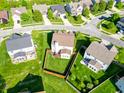 Aerial view of the home showing backyard with fence at 8644 N Deer Crossing Blvd, McCordsville, IN 46055