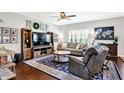 Cozy living room with plush seating, area rug, and lots of natural light at 1286 Brookdale Ct, Franklin, IN 46131