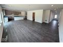 Open-concept living space featuring durable flooring and ample room for personalized design at 1534 Trichel Dr, Greenwood, IN 46143