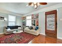 Bright living room with stylish decor, comfortable sofas, and large windows at 1867 Barth Ave, Indianapolis, IN 46203
