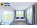Bright and airy sunroom with large windows overlooking the yard and comfortable seating at 19725 Highclere Lane, Sheridan, IN 46069