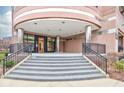 Building entryway featuring stone steps and a modern door at 225 N New Jersey St # 46, Indianapolis, IN 46204