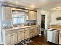 A well-designed kitchen boasts custom cabinets, modern appliances, and stylish finishes at 310 Styleline Dr, Mooresville, IN 46158