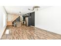 Open-concept kitchen featuring a unique island, stainless steel appliances and laminate floors at 1212 S Senate Ave, Indianapolis, IN 46225