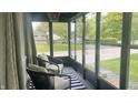 Relaxing sunroom featuring large windows providing plenty of natural light and a great view at 3324 S Walnut St, Muncie, IN 47302