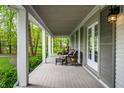 Inviting covered porch with comfortable seating, offering a relaxing outdoor space at 4130 N Meridian St, Indianapolis, IN 46208