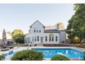 Backyard view featuring a sparkling blue pool, perfect for relaxation and summer fun at 107 W Columbine Ln, Westfield, IN 46074
