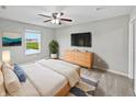 Serene main bedroom featuring a large window, and modern furniture at 1276 Sanderling Dr, Greenwood, IN 46143