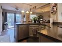 Well-appointed kitchen with stainless steel appliances, countertops, and access to the outdoors at 1714 Michelle Mnr, Danville, IN 46122