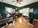 Versatile room with hardwood floors that can be used as a bedroom or a fitness area at 1332 W 26Th St, Indianapolis, IN 46208