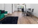 Open-concept living space with hardwood floors and ample natural light at 1837 S East St, Indianapolis, IN 46225