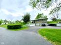 Large driveway leading to a two-car garage at 2221 E 35Th St, Anderson, IN 46013