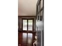 Inviting view into the house through glass paneled double doors and hardwood floors at 3559 S County Road 475 E, Plainfield, IN 46168