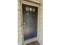 Stylish front door with a window, ring doorbell, and decorative Welcome mat at 3559 S County Road 475 E, Plainfield, IN 46168