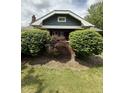 Charming bungalow home with updated colors and mature landscaping at 5960 Southeastern Ave, Indianapolis, IN 46203