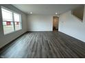 Bright and open living room area with vinyl floors at 1204 Mcbride St, Greenfield, IN 46140