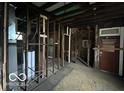 Interior shot of room under construction with partial flooring and equipment at 226 Miley Ave, Indianapolis, IN 46222