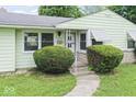 Inviting front entrance with stone accents and well-maintained shrubbery at 2840 W 12Th St, Anderson, IN 46011