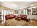Spacious living room with hardwood floors, built-in bookshelves, and plenty of natural light at 4410 N Pennsylvania St, Indianapolis, IN 46205