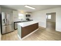 Modern kitchen with stainless steel appliances, island, and a bright, inviting atmosphere at 453 Illinois St, Fortville, IN 46040