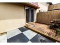 Enclosed patio with brick pavers, sliding glass door, and privacy fence at 8362 Punto Alto Dr, Indianapolis, IN 46227