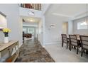 Open-concept entryway leads to dining area with carpet, and a spacious living room at 1274 Timber Bluff Rd, Westfield, IN 46074