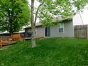 Spacious backyard with a wooden deck, perfect for outdoor entertaining and relaxation at 1612 Prairieview Ln, Greenfield, IN 46140