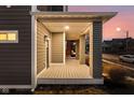 Inviting front porch with stylish columns and plenty of space for relaxing at 2024 Yandes St, Indianapolis, IN 46202