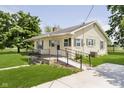 Lovely home with a ramp, well maintained lawn and comfortable porch at 3642 S Mauxferry Rd, Franklin, IN 46131