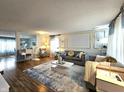 Bright living room showcasing modern decor, a stylish rug, hardwood floors, and contemporary furniture at 10836 Zimmerman Ln, Indianapolis, IN 46231