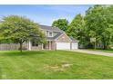 Home exterior boasts well-maintained landscaping at 113 Spring Creek Ct, Noblesville, IN 46062