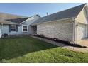 Single Gathering home featuring mature lawn and garden at 11523 Coastal Way, Indianapolis, IN 46229