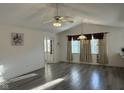 Spacious living room with vaulted ceilings and hardwood floors at 11523 Coastal Way, Indianapolis, IN 46229