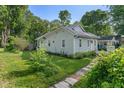 Well-maintained backyard with lush greenery and a serene, private atmosphere at 1802 E 66Th St, Indianapolis, IN 46220