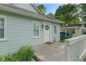 Close up of the inviting front porch and door of this lovely home at 1802 E 66Th St, Indianapolis, IN 46220