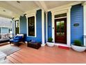 Inviting front porch with comfortable seating, stylish decor, and a warm, welcoming entrance at 2191 Greencroft St, Carmel, IN 46032