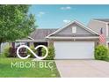 Charming single-story home featuring an attached two-car garage, landscaped yard, and a welcoming entrance at 2911 W Hawanian Ln, Monrovia, IN 46157